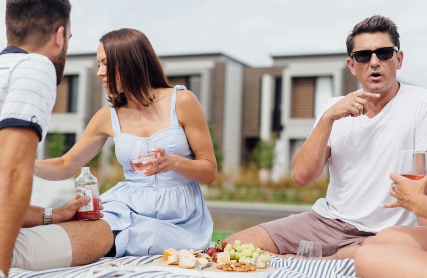 Couple having a picnic at Live West